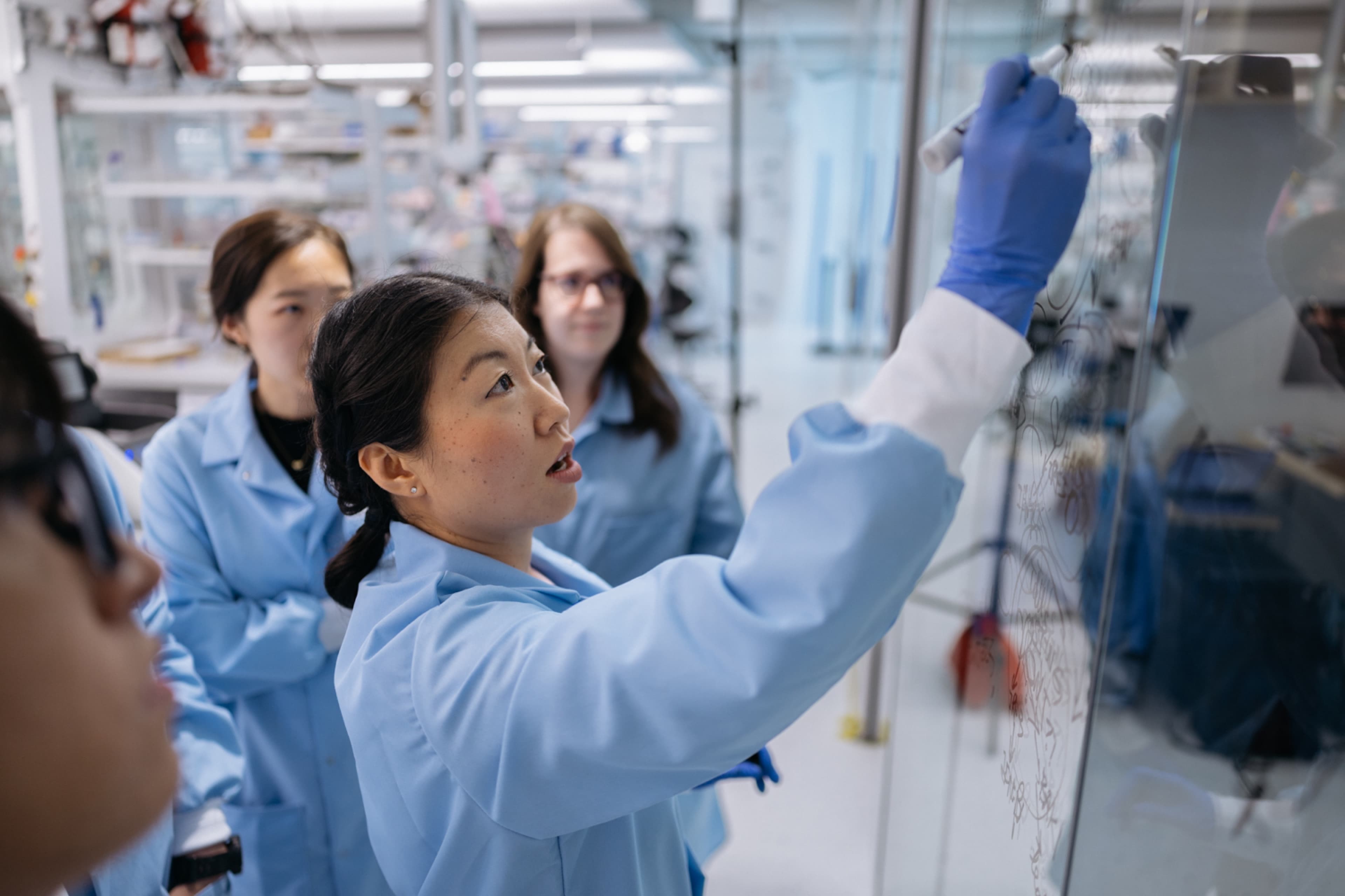 Professor Luke Gilbert in lab with a student